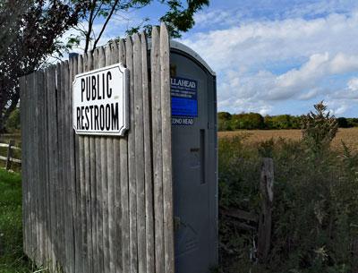 A portable lavatory in the parking lot behind Amagansett’s commercial district will be obsolete after the expected completion of a public restroom next year.