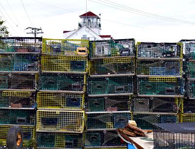 A wall of lobster pots spells the end of a season.