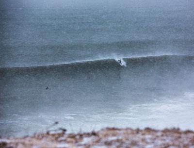 A few of Montauk’s hardcore surfers hit the waves, big waves, smack in the middle of the blizzard called Juno, and James Katsipis captured them in action.