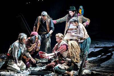 Long John Silver, with parrot, and his fellow pirates discover something astonishing in the National Theatre’s new production of “Treasure Island,” which will be simulcast at Guild Hall on Saturday.