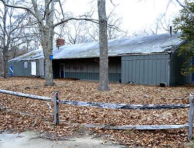 The mess hall building at the former Boys Harbor camp in East Hampton, now owned by the town, could become an open-air pavilion for a while, until it can be rebuilt.