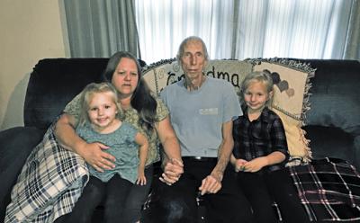 Lester (Zeke) Forbell, seen here last week with his wife Marianne Forbell, and their grandchildren Emma, left, and Jaiden, right, is out of work while he undergoes treatment for Stage 4 Pancreatic cancer.