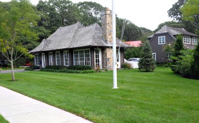 Michael Davis, a builder, hopes East Hampton Town will allow him to merge two nonconforming properties east of his Wainscott office.