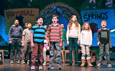 Yanddel Atariguana, front left, and Isaac Rodriguez, front right, star in “The Peacock’s Tale” as Joseph and Porfirio Goncalvez, two boys who immigrated from Portugal to Springs in 1962 and who became the inspiration for this year’s fourth-grade opera.