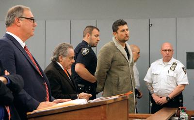 Sean P. Ludwick, fourth from left, was ordered held without bail on Tuesday.