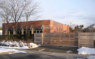 A fence Steven A. Cohen had built in front of his renovated building on Pantigo Road, East Hampton, was the subject of a planning board discussion on Feb. 9.