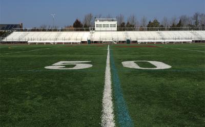 East Hampton High School’s football field, pictured here, is artificial turf. Plans to install a similar turf playing field at the Pierson Middle and High School have come under scrutiny by some parents.