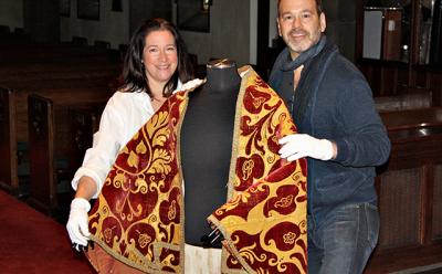 Jill Lasersohn and Charles Keller gingerly handled a large Italian velvet kermes dyed cope dated to about 1420 to 1430.