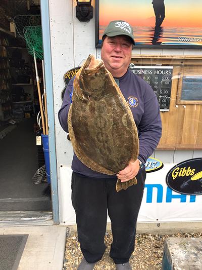 Bob Johnson of Sag Harbor caught a 12.8-pound fluke off Shelter Island last week.