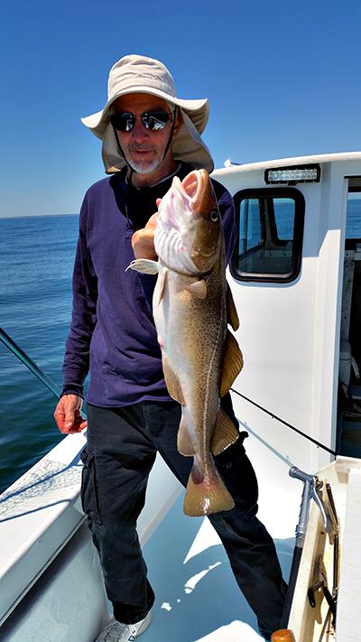 John Ebanks held a cod caught south of Montauk Point.