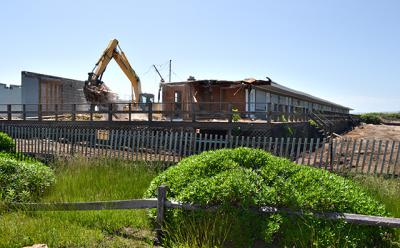 Protesters came out in force two years ago when the owners of the East Deck announced plans for a private beach club with its own restaurant and below-grade parking on the property. Now it’s being demolished to make room for four house lots.