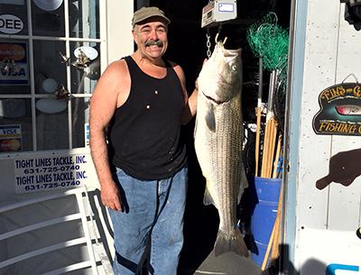 Wind made fishing tough this week, but Mike Manzare managed to catch a 38-pound striper in the bay.