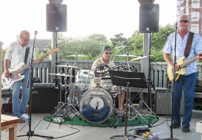 The 3Bs entertained a crowd at the downtown Montauk green on Monday night, while the Montauk Citizens Advisory Committee, meeting a short distance away, discussed the advantages and disadvantages of holding large events on the green.