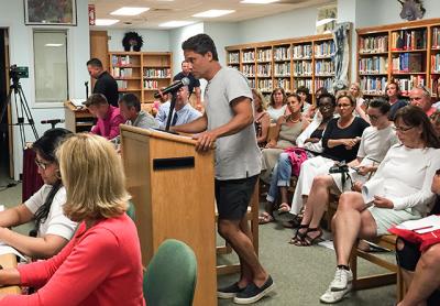 Larry Baum, a parent of four, was one of many parents urging the Sag Harbor School Board on Monday to extend the superintendent’s contract.