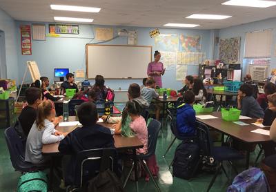 The Springs School’s fourth grade has 75 students and average class sizes of 25. Above, Beth Scammell, with her fourth-grade class.