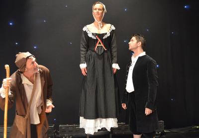 Nick Gregory, Chloe Dirksen, and Michael Raver in "The Scarlet Letter"