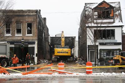 By Saturday the Sag Harbor Cinema’s lobby, including the RJD Gallery, had been demolished, leaving a hole on Main Street. The Compass building, to the right, was taken down on Monday.