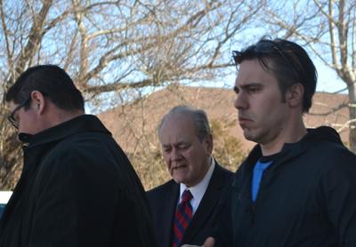 Robert Andrade, right, left East Hampton Town Justice Court last Thursday after he was arraigned on four misdemeanor charges related to an alleged under-age party house in Springs.