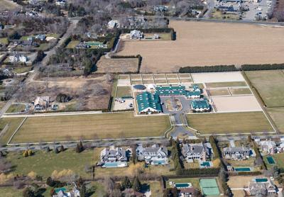 Neighbors are not happy with the size of Campbell Stables in Bridgehampton, but the issue before the Southampton Town Planning Board is whether to legalize a service road and structure with a horse walker already there and whether to allow the owners to add more horses and a temporary tent in the summer.