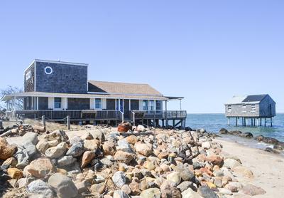 A Lazy Point property mortgage that is financially underwater and the house it covers can be yours at an auction to be held on the steps of Town Hall Tuesday.