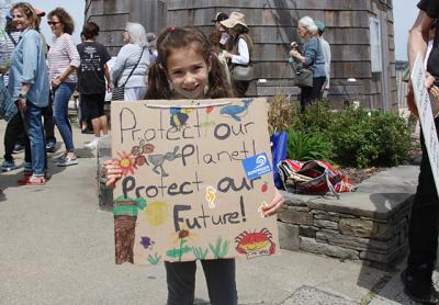 Kiana Dias was among the younger set of South Fork residents joining in a march and rally for action on climate change in Sag Harbor on Saturday.