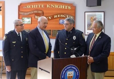 P.J. Cantwell, third from left, an East Hampton Village public safety dispatcher, was promoted to supervisor, and was honored at the village board meeting on Friday by acting police chief Michael Tracey, Richard Lawler, a village board member, and Mayor Paul F. Rickenbach Jr.