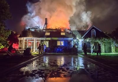 The roof and second floor of a house on Talmage Farm Lane in Springs were damaged by smoke and fire Saturday night.