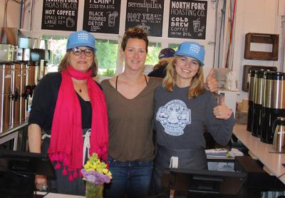 Juliana Nash, Amanda Merrow, and Ruby Stenerson at the Amber Waves Farm Market.