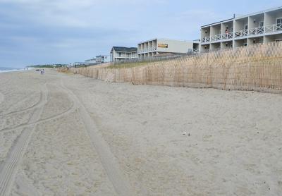 Retreat from the downtown Montauk shore, with the oceanfront row of motels moved back to fill in gaps on the next street up and dunes taking their place, is among the recommendations in a draft plan for the hamlet.