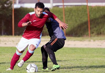 Try as they might, John Romero Jr. and his Maidstone Market teammates c­ould do nothing against Hampton F.C.-Bill Miller on June 14. Bill Miller won the game 4-1.