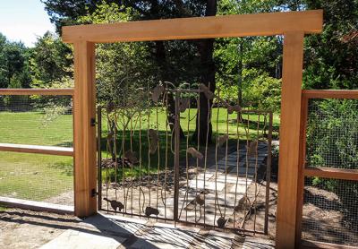 The metalsmith is proud of this intricate gate on East Hollow Road.