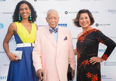 Christina Lewis Halpern, left, and her mother, Loida Lewis, right, will host a fund-raiser for All Star Code, which Ms. Halpern founded, on Saturday. They are pictured at last year’s event with David Dinkins, a former mayor of New York City.