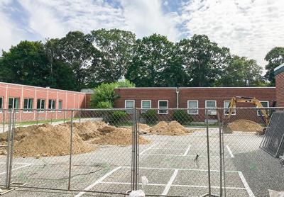 Excavation of cesspools at the Spring School began on Tuesday to help determine a solution for the ongoing septic issues.