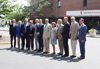 State officials were on hand for the unveiling of the new Stony Brook Southampton Hospital sign at the entrance to the hospital on Monday. The official merger took place on Aug. 1.