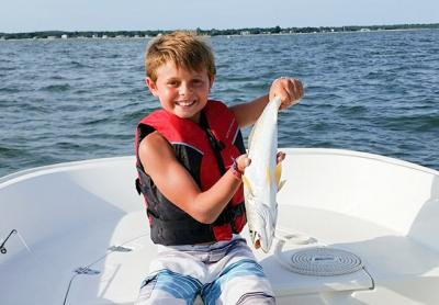 Mason Mannino, 10, of Sag Harbor held a weakfish he caught in Noyac Bay.