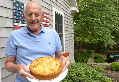 Among the four blue ribbons James Lubetkin brought home to Amagansett from the New York State Fair in Syracuse was one for his French apple Breton pie, a version of which he was holding.