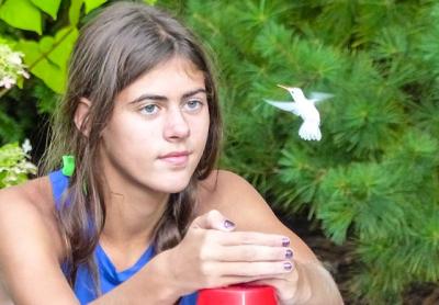 Alexandra Carr, a 13-year-old birdwatcher, was delighted to find an albino hummingbird at one of her family’s feeders in Amagansett earlier this month.