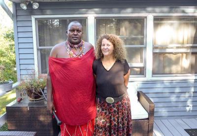 At her house in Sag Harbor, Kenny Mann, right, hosted her friend Nickson Parmisa, a Maasai chief from Kitengela, Kenya, a town not far from where she grew up.