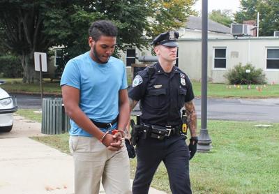 Luis Baldayac, who was arrested on two counts of burglary in the second degree in connection to a break-in at the Lido Motel in Montauk on Sunday, was led into East Hampton Town Justice Court on Tuesday morning.