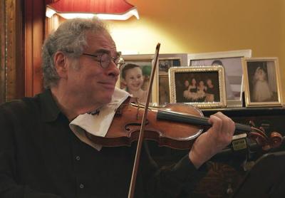 Itzhak Perlman in a scene from “Itzhak,” a documentary having its world premiere as the opening night film of the Hamptons International Film Festival.