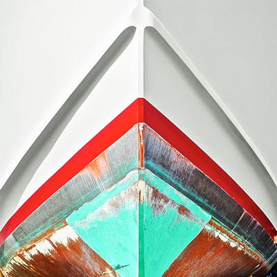 Michele Dragonetti’s “Waterline” is one of many of her boat hull photographs on view at Roman Fine Art in East Hampton.