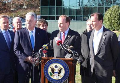 At a press conference last month, Representatives Lee Zeldin, center, Peter King, left, and Tom Suozzi, right, and other state and local officials and business interests highlighted their concerns about the proposed tax bill.