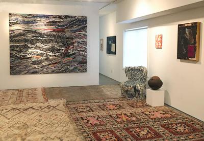 Moroccan rugs and, from left, Jayson Musson’s “Mass Shadow Generator,” a South African Zulu pot, Hank Willis Thomas’s “D Block,” and Sterling Ruby’s “D.C.” at the Rental Gallery