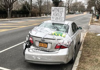 The owner of this car believes a town employee crashed a large snow blower into its rear, causing extensive damage, and is hoping a witness will come forward.