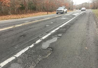 A mass of potholes mars a particularly bad section of Route 114 between Stephen Hand’s Path and Sag Harbor. Officials are urging the State Department of Transportation to resurface the road in the spring.