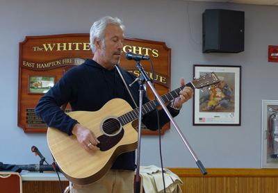 Paul Fried voiced his support for lifting the ban on amplified live music by singing for the village board.