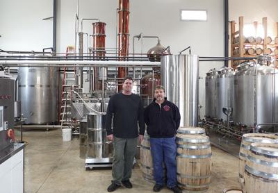 Dean Foster, right, and Matt Beamer’s Sagaponacka vodka is designed to showcase the flavor of East End produce.