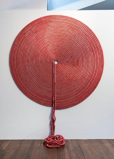 A wall piece by Alice Hope, above, that resembles a coil of rope is actually constructed from dyed soda can tabs and tubing. The black-and-white organic forms in Hiroyuki Hamada’s large-scale prints, below, are similar to those found in his three-dimensional work.