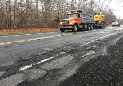 This ravaged section of Route 114 north of Stephen Hand’s Path in East Hampton is one of eight portions of the roadway that will be resurfaced this year.