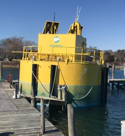 The Manna Fish Farm automatic fish-feeding station, now docked at Prime Marina in Hampton Bays